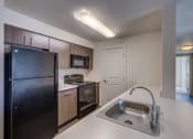 Thumbnail 9 of 19 - Kitchen at GATEWAY BY VINTAGE, Spanaway, WA 98387