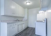 Thumbnail 4 of 6 - Kitchen with new flooring