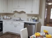 Thumbnail 2 of 36 - Fully Equipped Eat-In Kitchen at Savannah Court of Camilla, Camilla