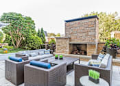 Thumbnail 21 of 36 - Outdoor Patio with Fireplace