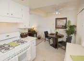 Thumbnail 16 of 33 - Partial View of Kitchen and Dining Area - Fairway Estates