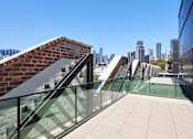 Thumbnail 25 of 33 - Deck with city views - The Briscoe by Kinleaf