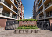 Thumbnail 10 of 17 - Crowle Estate sign in front of a building.