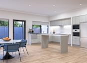 Thumbnail 13 of 15 - A modern kitchen with a dining table and chairs.