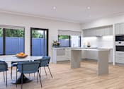 Thumbnail 6 of 6 - A modern kitchen with a dining table and chairs.