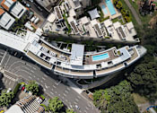 Thumbnail 4 of 24 - A bird's eye view of a residential area with a swimming pool.
