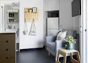 Thumbnail 9 of 13 - a living room and kitchen in a small apartment