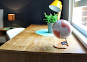 Thumbnail 1 of 5 - a wooden table with a globe on top of it