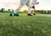 Thumbnail 2 of 3 - two people playing a game of golf on the grass