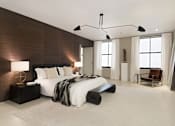Thumbnail 1 of 7 - A modern bedroom with a large bed and a chair.