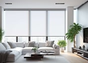 Thumbnail 9 of 20 - A modern living room with a white sofa, a coffee table, and a large window at Bluebell Ridge, Denver