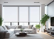 Thumbnail 13 of 20 - A modern living room with a white sofa set, a coffee table, and a large window.