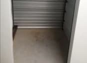 Thumbnail 16 of 22 - a grey garage door with a rope hanging from it
