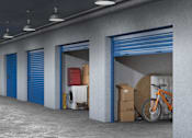 Thumbnail 22 of 22 - A storage room with blue doors and a bicycle inside.