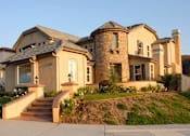 Thumbnail 4 of 7 - a large house with a staircase in front of it
