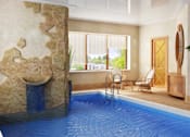 Thumbnail 1 of 7 - a swimming pool with a stone wall and a blue pool