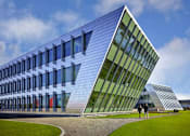 Thumbnail 3 of 112 - a building with a triangular shape
