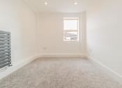 Thumbnail 7 of 10 - Interior of a bedroom
