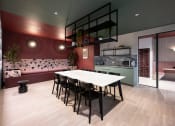 Thumbnail 9 of 20 - a dining room with a white table and chairs and a kitchen