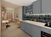 Thumbnail 22 of 26 - A kitchen with a blue backsplash and grey cabinets.