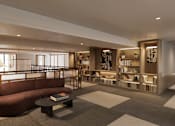 Thumbnail 5 of 26 - A modern living room with a red sofa and a coffee table.