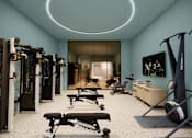 Thumbnail 20 of 26 - A modern gym with a variety of equipment including treadmills, weights, and exercise machines.