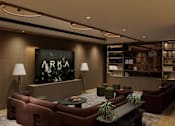 Thumbnail 1 of 26 - A modern lounge area with a large screen displaying the word "ARKA".