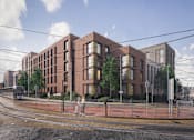 Thumbnail 14 of 17 - A modern brick building with a street in front of it.