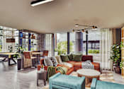 Thumbnail 4 of 17 - A modern living room with a large window and a variety of furniture.