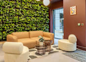 Thumbnail 18 of 49 - A living wall of greenery in a waiting room.
