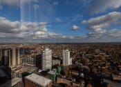 Thumbnail 32 of 37 - a view of the city from the top of a skyscraper