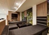 Thumbnail 2 of 39 - a room filled with furniture and a flat screen tv
