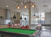 Thumbnail 1 of 50 - a pool table and a foosball table in the games room