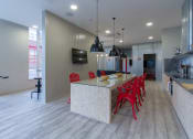 Thumbnail 6 of 50 - a view of the kitchen and dining area from the living room