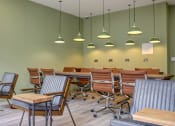 Thumbnail 8 of 50 - a conference room with a long table and chairs