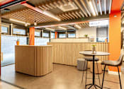 Thumbnail 35 of 51 - Bright reception space with brown panelling.
