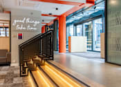 Thumbnail 41 of 51 - 3 stairs with under-lighting and railing, from corridor leading to courtyard to ground floor social space.
