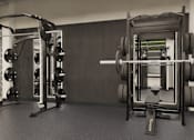 Thumbnail 32 of 34 - A black and white image of a gym with weightlifting equipment.