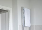 Thumbnail 4 of 22 - a bathroom with a shower and a towel rack and a sink