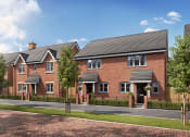 Thumbnail 6 of 12 - a row of red brick terraced houses