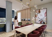 Thumbnail 5 of 23 - A woman is standing in a room with a long table and chairs.