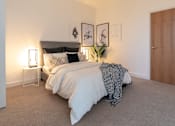 Thumbnail 25 of 32 - a bedroom with a bed and a wooden closet at The Keel Apartments, Liverpool, L3 4GE