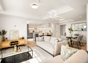 Thumbnail 8 of 24 - A modern living room with a glass coffee table and a white sofa.