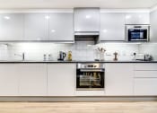 Thumbnail 7 of 22 - New Orient House, London - Shared Kitchen, 1