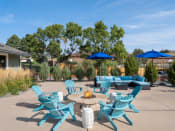 Thumbnail 13 of 27 - Clubhouse Patio with Firepit at Briargate, Colorado Springs, Colorado