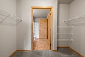 Thumbnail 60 of 126 - a spacious walk in closet in a 555 waverly unit