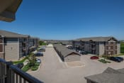 Thumbnail 116 of 126 - an aerial view of an apartment complex with a blue sky in the background