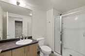 Thumbnail 15 of 30 - a bathroom with a toilet sink and shower at Allez, Redmond, Washington