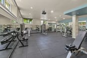 Thumbnail 20 of 30 - a spacious fitness center with treadmills and other exercise equipment at Allez, Redmond, 98052