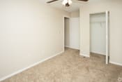 Thumbnail 8 of 26 - Bedroom with ceiling fan and light at Springbrook Townhomes Apartments,Tallahassee, Florida, FL